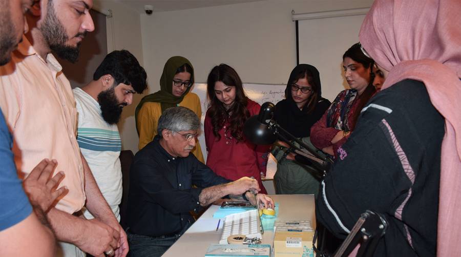Prof. Arham Chohan teaching pediatric dentistry during IADSR’s hands-on workshop in May 2025