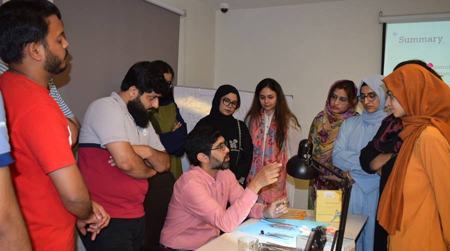 dental professionals learning periodontal surgery techniques during hands‑on workshop at iadsr