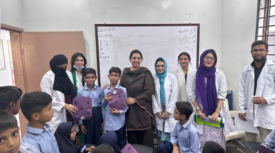 LCMD dental outreach team conducting oral health awareness camp for children in Karachi
