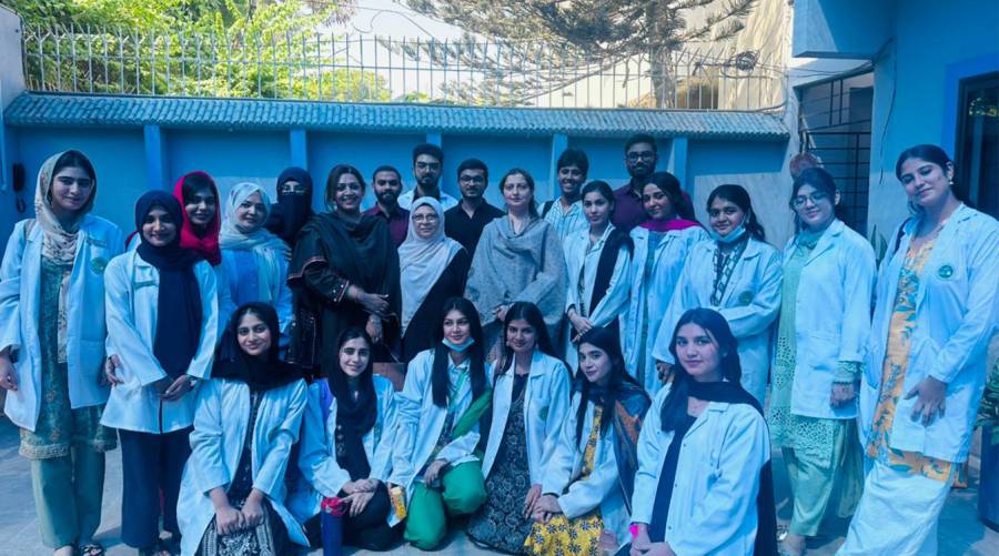 LCMD dental outreach team conducting oral health awareness camp for children in Karachi