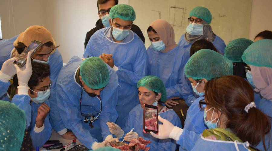Participants attending a hands-on periodontology workshop at IADSR under the guidance of Dr Farheen Qureshi.