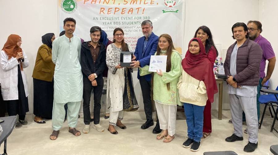 Students from LCMD present their dental-themed artwork during the canvas painting competition 2025.