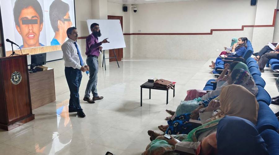 FJIDS orthodontic faculty and postgraduate residents during a case-based discussion on orthodontic camouflage