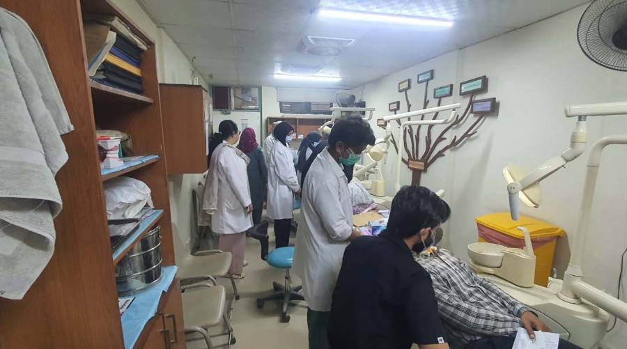 Hamdard University second-year BDS students receiving supervised oral diagnosis and patient examination training.