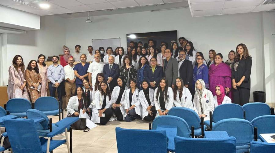 Second-year BDS students present oral health and preventive dentistry posters at Altamash Institute of Dental Medicine.