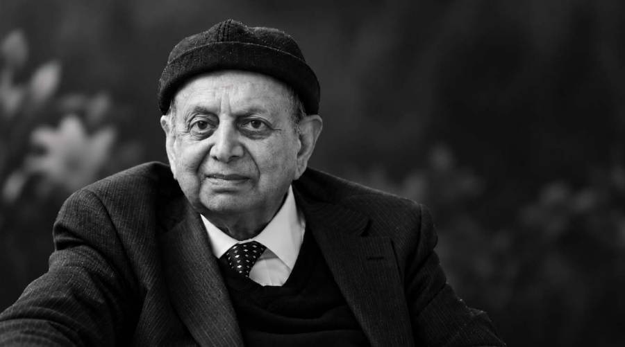 Black-and-white portrait of Professor Emeritus Dr. Ahmad Iqbal.