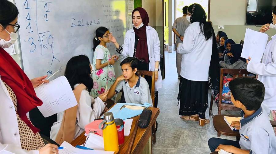 Shifa College of Dentistry faculty and BDS students conduct oral health screening and preventive dental care activities for children at House of Light School in Pind Bhagwal Village, Islamabad.