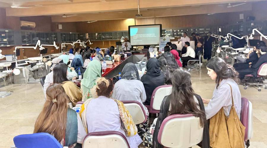 Participants attend an oral cancer screening workshop at LUMHS, Jamshoro.